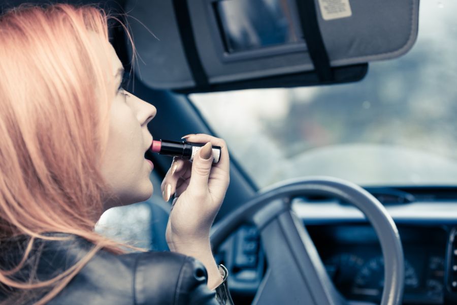 careless driving might be putting on makeup while driving